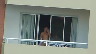 voyeur girl nude in balcony  argentina . far away ( 200 m)