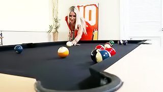 Blonde loves playing billiards so much